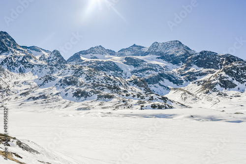 Bernina, Lago Bianco, Cambrena, Gletscher, Alpen, Graubünden, Winter, Schneedecke, Berninaexpress, Berninapass, Zugfahrt, Wintersport, Eis, Stausee, Schweiz photo