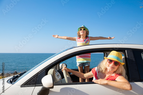 Happy family travel by car on summer vacation