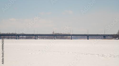 Long transport bridge across the river. © Prikhodko