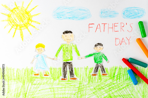 Father, son and daughter are depicted in a children's drawing. The inscription father's Day.