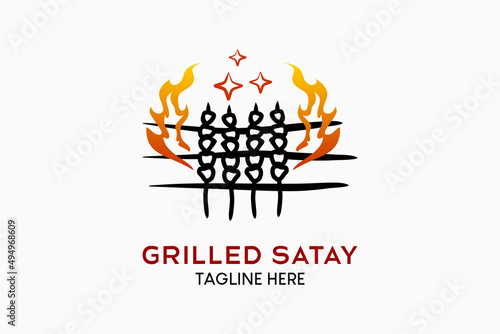 Grilled satay logo design with hand drawn creative concept. The satay icon blends with the fire icon. Grilled meat logo illustration