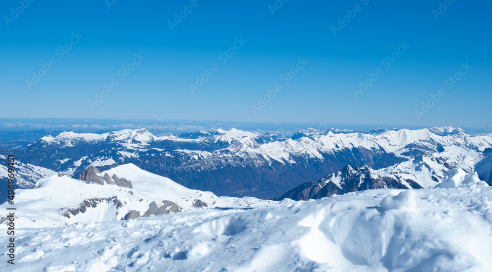 View from the peak of Schilthorn in Jungfrau ski arena, Switzerland, over numerous alpine summits