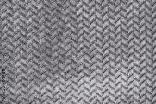 Handmade grey knitting wool texture background. Abstract.