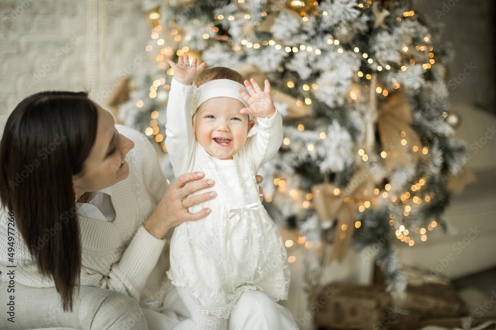 mother hugs little daughter, happy family relationship