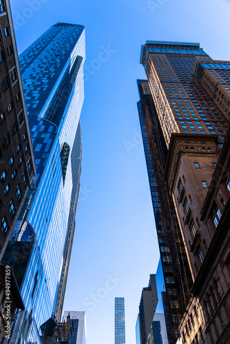 Newly built ultra luxury high-rise residential buildings stand on West 57th street in Billionaires    Row among Midtown Manhattan skyscraper on November 8  2021 in New York City NY USA. In the front row