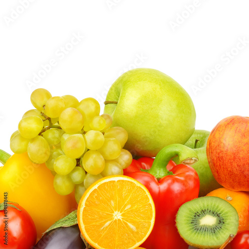 Fruits and vegetables on a platter isolated on a white . There is free space for text.