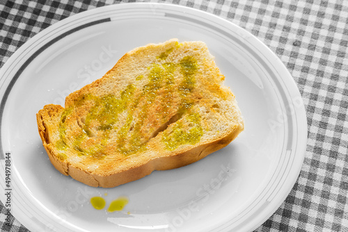 Rustic bread toast with extra virgin olive oil