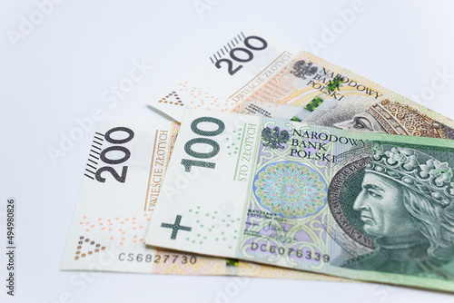 Zloty - Polish banknote. Polish currency on a white background arranged in a pattern. Illustrates cash flow and business