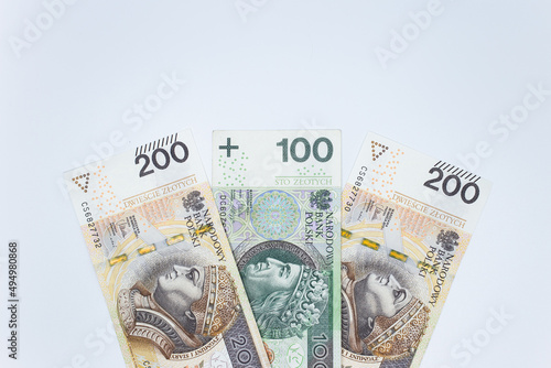 Zloty - Polish banknote. Polish currency on a white background arranged in a pattern. Illustrates cash flow and business