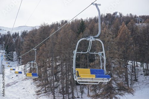 colorful ski lift chairs in Risoul/Vars, Alps, France ski resort in winter photo