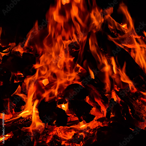 Fire flames on black background, Blaze fire flame texture background, Beautifully, the fire is burning, Fire flames with wood & cow dung