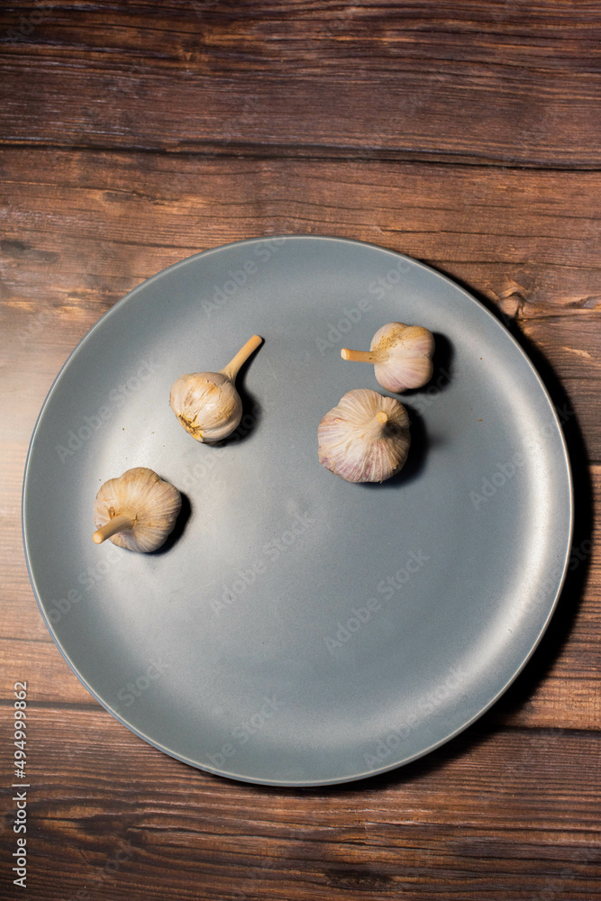 food on a plate on the table apple profiteroles garlic food on a plate on the table apple profiteroles garlic