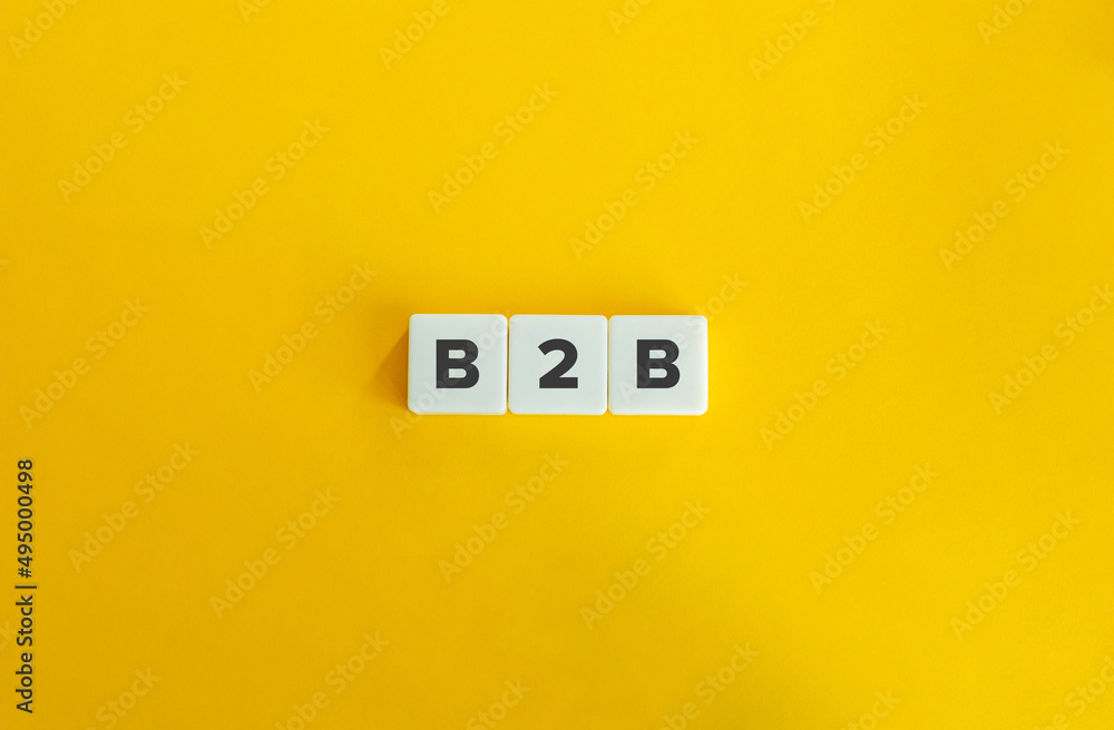 Business to business (B2B) Banner. Letter Tiles on Yellow Background. Minimal Aesthetics. Business to business (B2B) Banner. Letter Tiles on Yellow Background. Minimal Aesthetics.