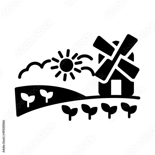 Rural landscape with windmill glyph icon