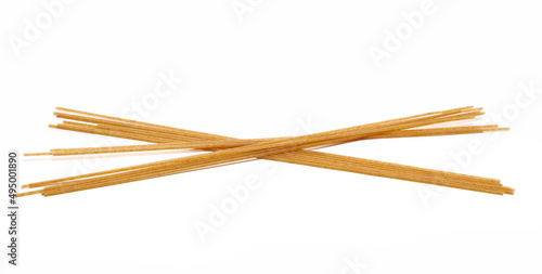 Integral spaghetti, organic whole wheat pasta isolated on white 