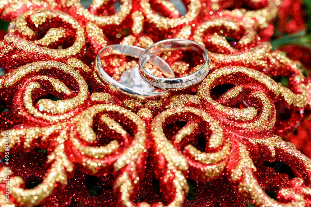 wedding gold rings on a beautiful shiny background wedding gold rings on a beautiful shiny background