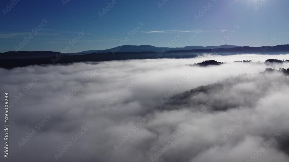 Drone view of clouds above planinsko polje in notranjska region of slovenia, on a cloudy summer day. Drone view of clouds above planinsko polje in notranjska region of slovenia, on a cloudy summer day.
