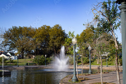 Beautiful Fountain with Classic Lamp Posts Lining a Walking Path in the Louis Armstrong Park in New Orleans, Louisiana, USA