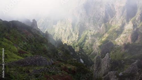 Aerial 4K footage of a drone flight in sky mountains Pico do Arieiro in Madeira
