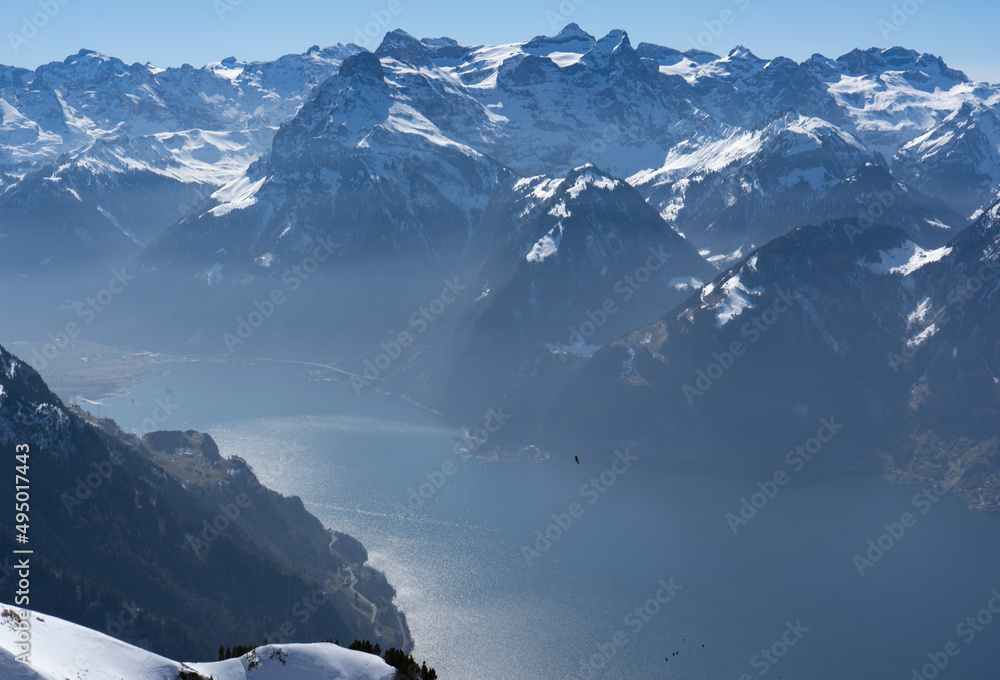 Pilatus – the dragon mountain on Lucerne’s doorstep. Escape the city and head up to Pilatus Kulm at an altitude of 2'132 m on the world’s steepest cogwheel railway. The arrival by boat or by train - obrazy, fototapety, plakaty 
