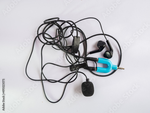 headphone and microphone using splitter jack isolated on white background