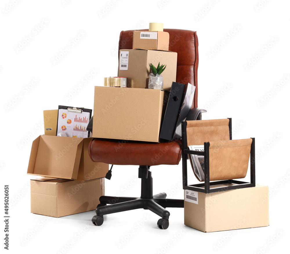 Fototapeta premium Cardboard boxes with stuff and office chair on white background