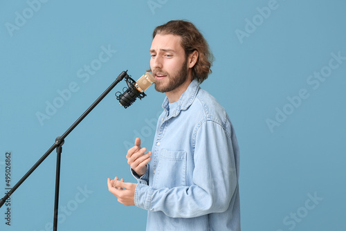 Handsome young man singing ...