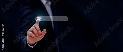 Search engine optimize on business web bar banner, businessman hand touching button of blank search bar screen background, business and technology concept, web banner, Search engine optimize concept