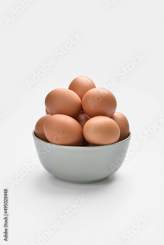 Fresh brown chicken eggs in...