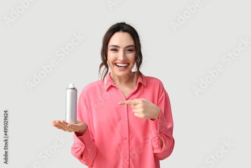 Pretty young woman with hai...