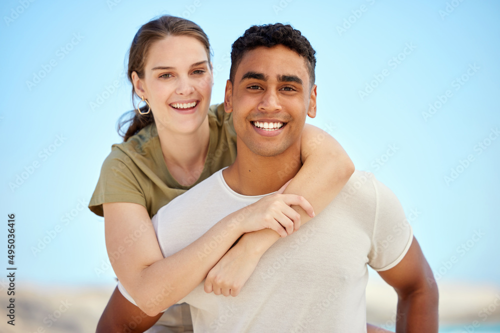 Were bringing out our summer smiles. Shot of a young couple enjoying a day at the beach. Were bringing out our summer smiles. Shot of a young couple enjoying a day at the beach.