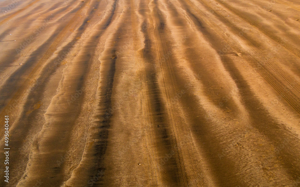 Pattern created on sea sand Pattern created on sea sand