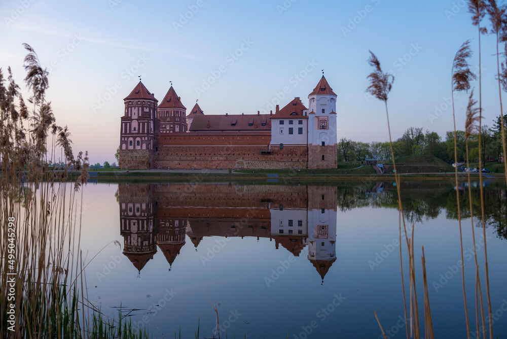 View of the ancient Mir castle in April twilight. Mir, Belarus View of the ancient Mir castle in April twilight. Mir, Belarus