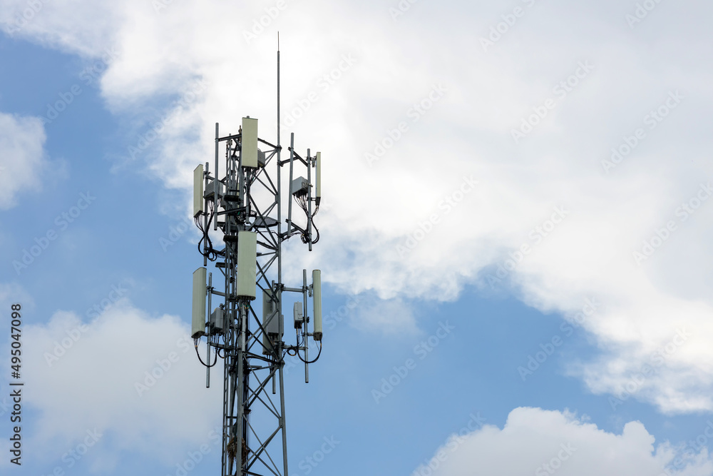 Communication tower top. Radio antenna Tower , microwave antenna tower on light sky background. wireless technology concept. communication development concept. image for objects and article. Communication tower top. Radio antenna Tower , microwave antenna tower on light sky background. wireless technology concept. communication development concept. image for objects and article.