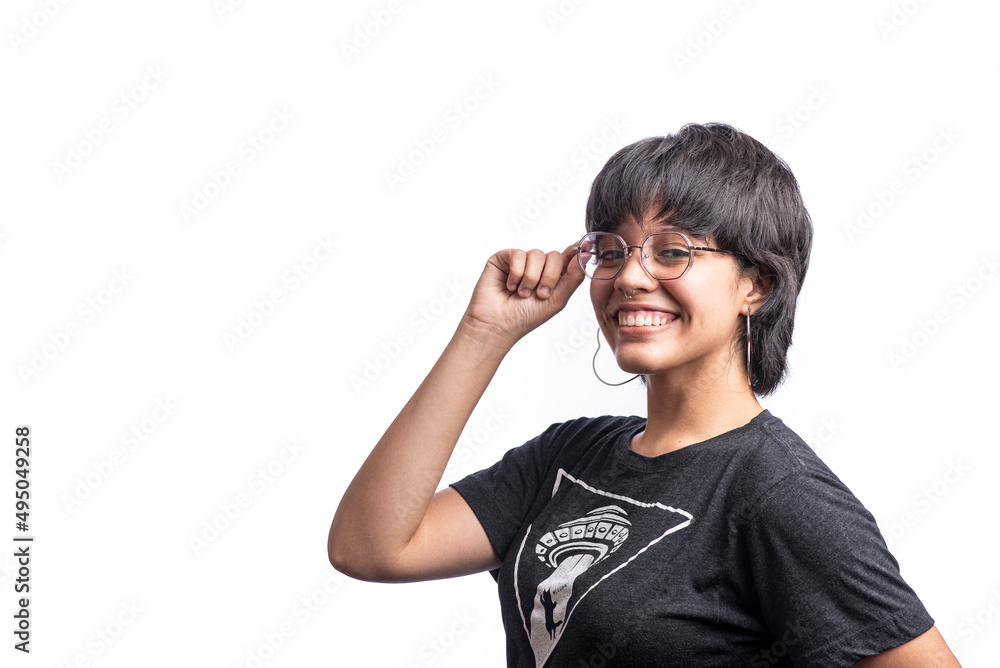 Smiling short-haired latina woman holding her glasses on a white background Smiling short-haired latina woman holding her glasses on a white background