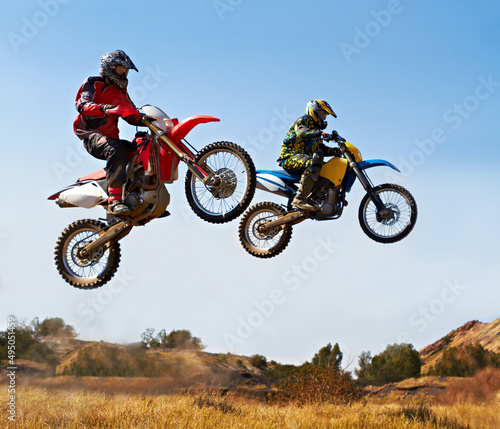 Ready for racing adventure. Shot of dirtbike racers. photo