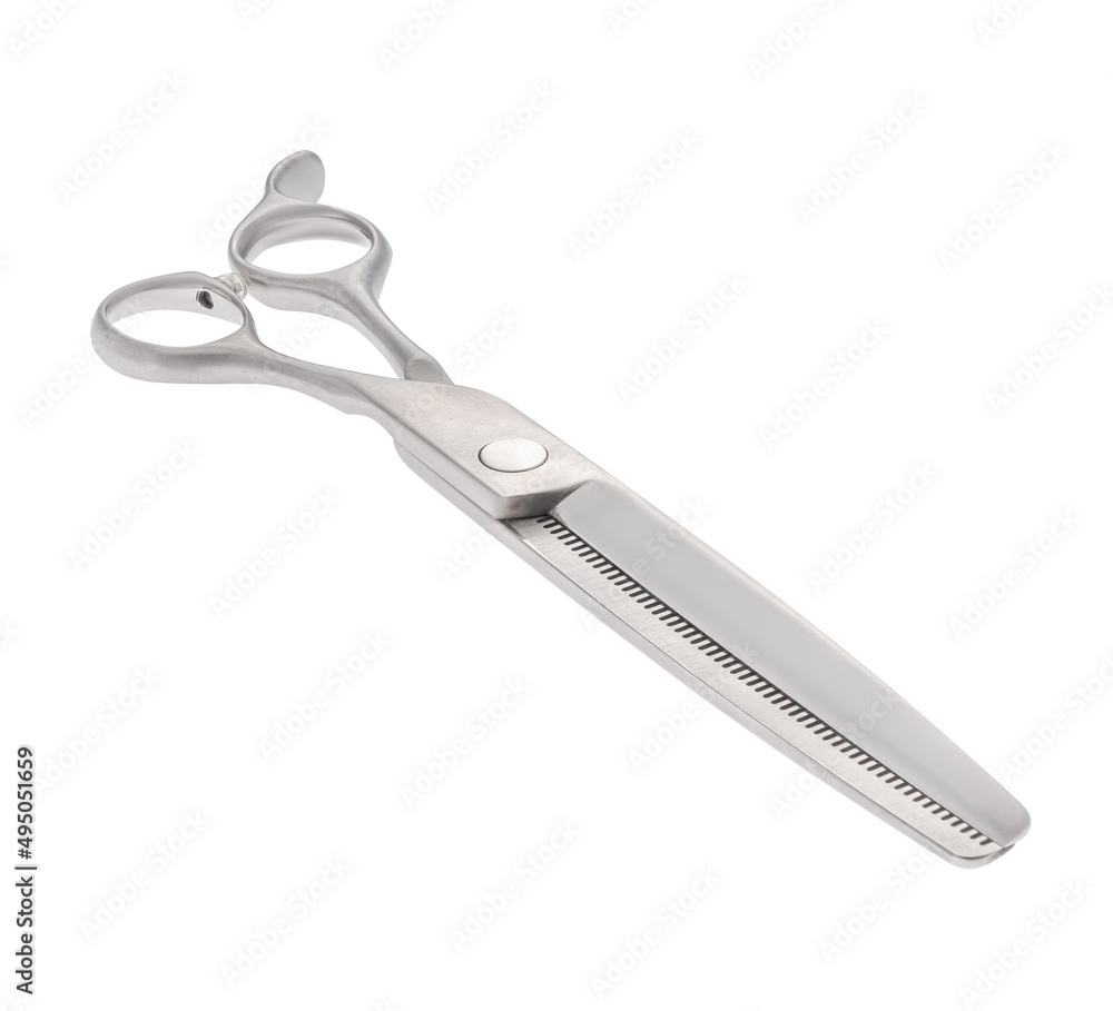 Scissors for cutting people and pets. Grooming scissors. Closed scissors on a white isolated background. Angle view. Scissors for cutting people and pets. Grooming scissors. Closed scissors on a white isolated background. Angle view.
