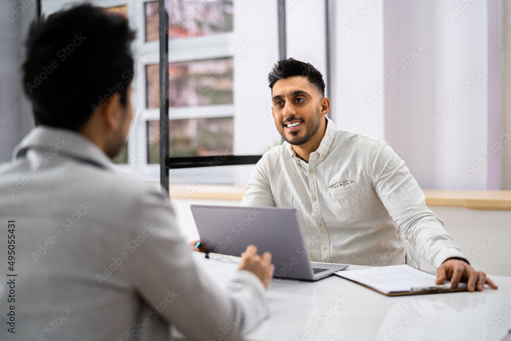 Businessman Conducting An Employment Interview Businessman Conducting An Employment Interview