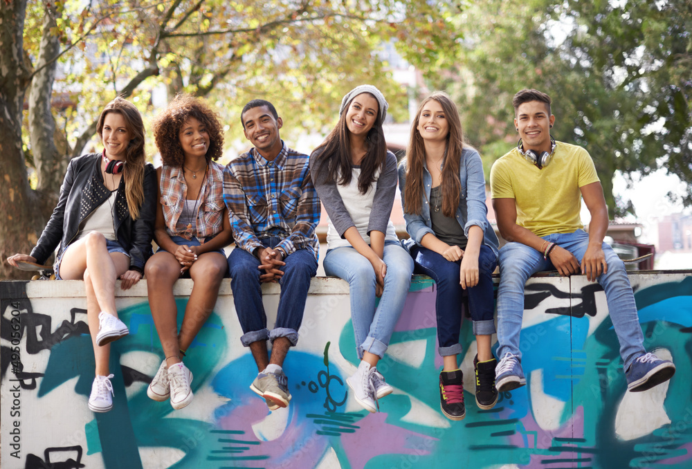 Their favorite city hangout. A group of friends chilling outdoors during the summer. Their favorite city hangout. A group of friends chilling outdoors during the summer.