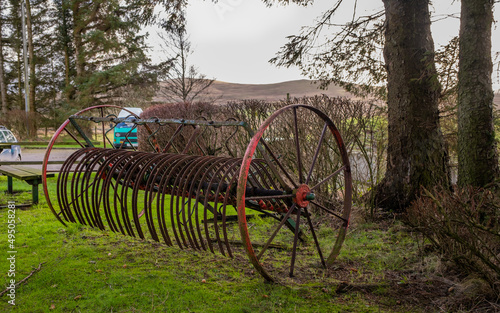 Fotografie Rusty old horse drawn agricultural hay rake, Carsphairn, Scotland