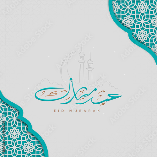 Arabic Calligraphy Of Eid Mubarak With Doodle Style Crescent Moon, Mosque Minarets And Laser Cut Islamic Pattern On Gray Background.