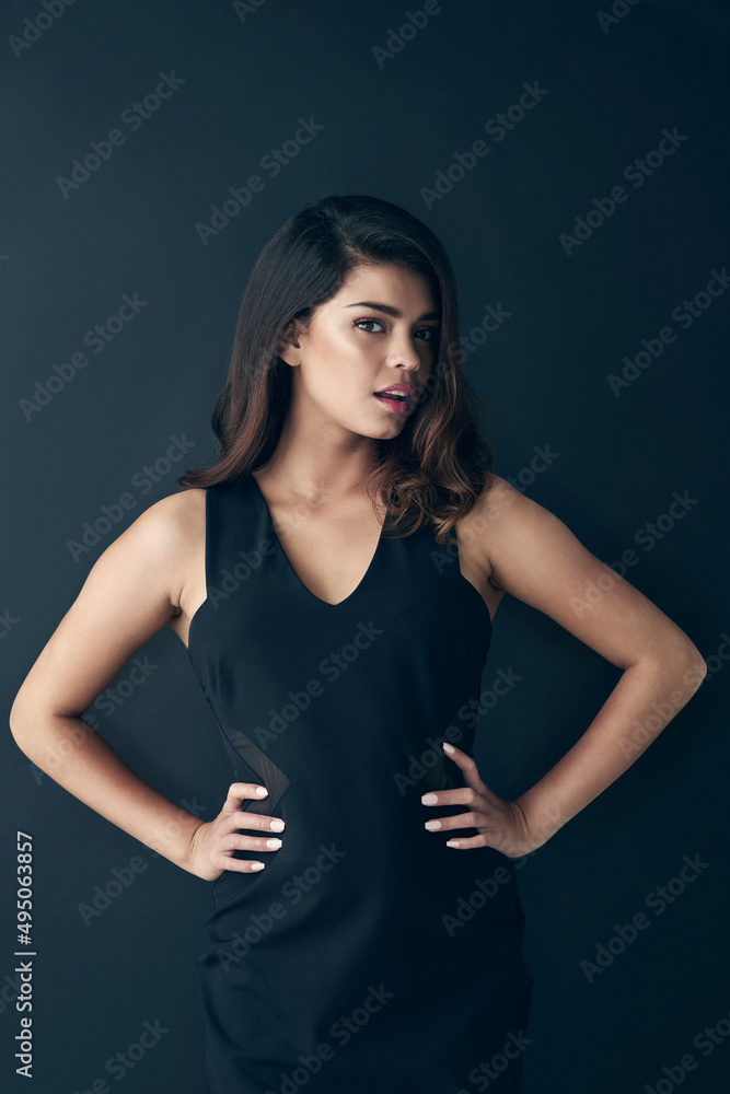Be your own standard of class. Cropped shot of a beautiful young woman posing in the studio. Be your own standard of class. Cropped shot of a beautiful young woman posing in the studio.