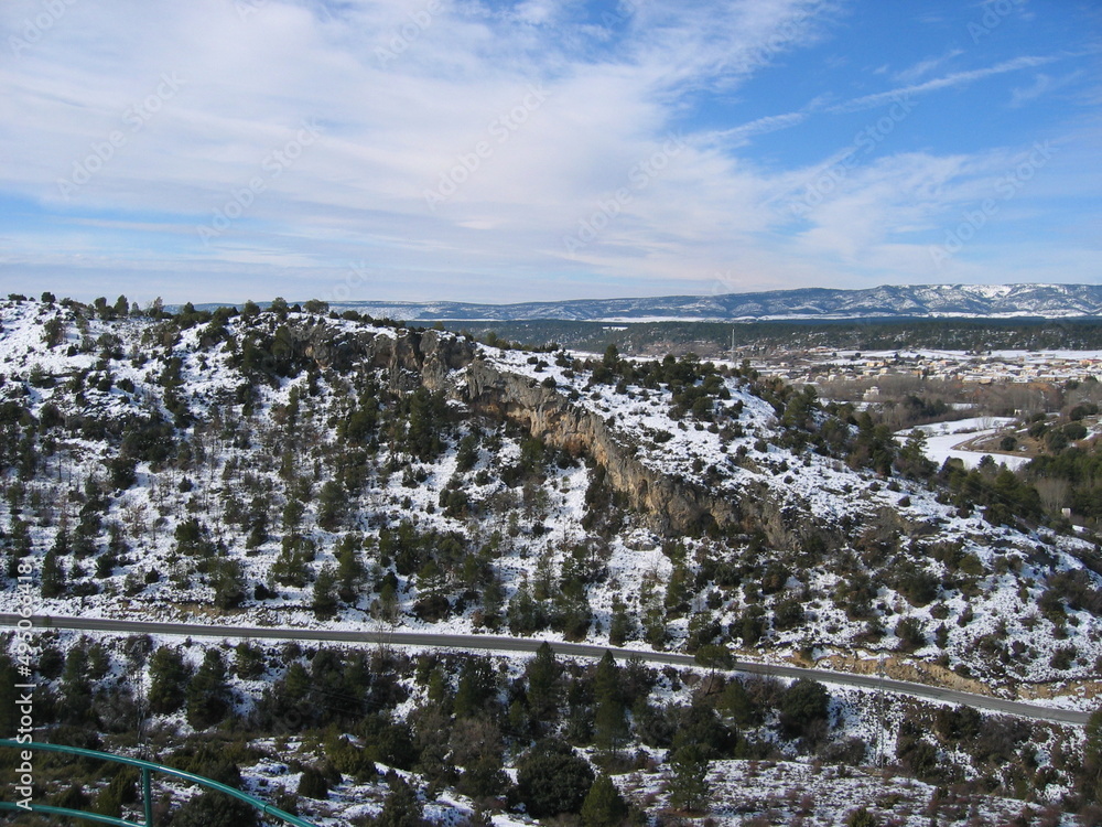 Beautiful snowy views of the mountains and the city of Cuenca