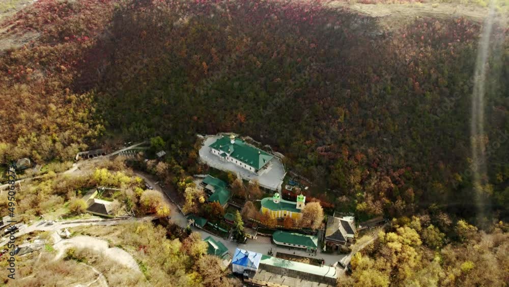 Beautiful 4K panoramic aerial video from flying drone to Orthodox Church in nature. Religion Culture with old church in Forest. Cathedral Ortodox exterior in Nature. Beautiful 4K panoramic aerial video from flying drone to Orthodox Church in nature. Religion Culture with old church in Forest. Cathedral Ortodox exterior in Nature.