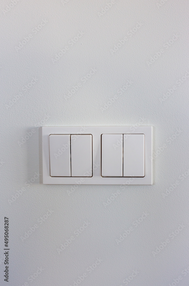 White light switches on a white wall White light switches on a white wall