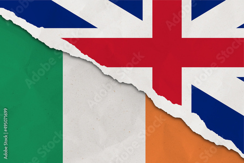 United Kingdom and Ireland flag ripped paper grunge background. Abstract United Kingdom and Ireland economics, politics conflicts, war concept texture background photo