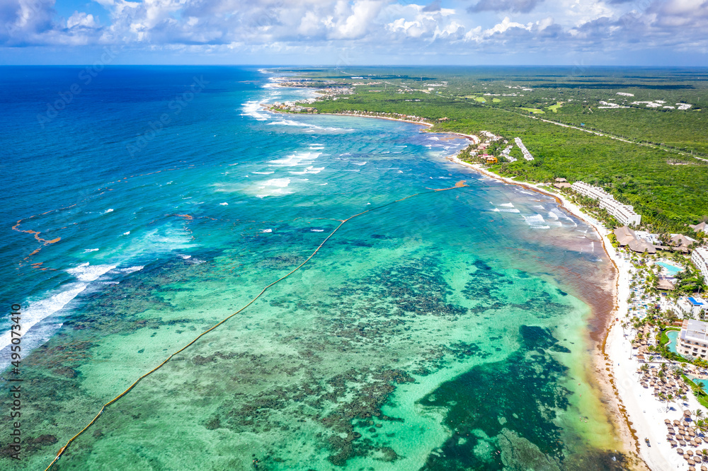 Aerial view of the Akumal Bay in Quintana Roo, Mexico. Caribbean Sea, coral reef, top view. Beautiful tropical paradise beach