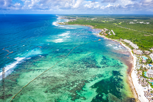 Aerial view of the Akumal Bay in Quintana Roo, Mexico. Caribbean Sea, coral reef, top view. Beautiful tropical paradise beach