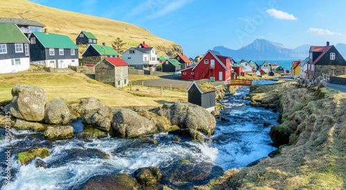 Gjov, Faroe Islands; March 20, 2022 - A view of the village of Gjov in the Faroe Islands. photo