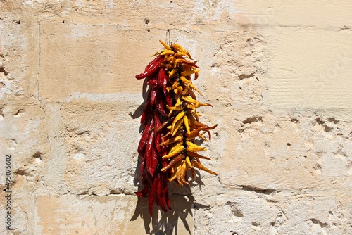 Italy, Basilicata: Peppers left to dry in the sun.